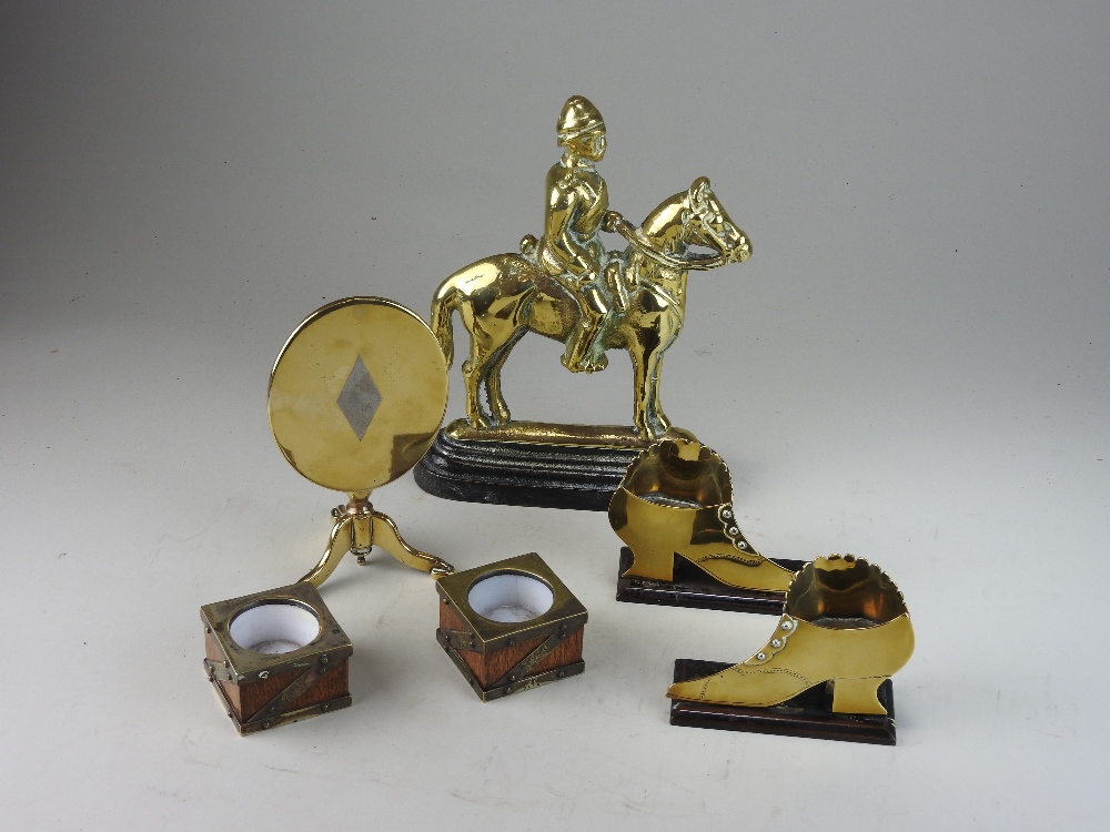 A pair 19th century brass mantle match holders in the form of shoes,