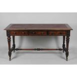 A Victorian mahogany library three drawer table, of rectangular form with replaced skiver,