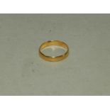 A 22ct gold plain polished wedding band