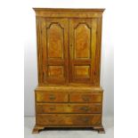 A late 18th / early 19th Century Continental walnut press cupboard, possibly South German,