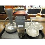 Three pieces of Art Nouveau pewter including a twin handled bellied vase,