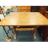 A 20th century oak refectory type dining table