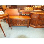 A reproduction oak sideboard cabinet,