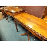 An Edwardian mahogany fold-over pedestal card table together with an Edwardian mahogany serpentine