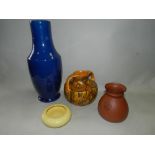 A pair of C H Brannam, Barnstable pottery vases dated 1929, a C H Brannam yellow glazed pot,