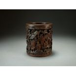 A Chinese carved hardwood brush pot, bitong, Qing Dynasty,