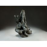 A Chinese bronze figure of a dragon on a rock, late Qing Dynasty,