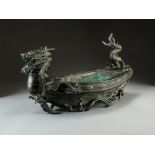 A Chinese bronze dragon boat planter, 19th Century,