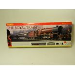 A Hornby 'The Royal Train' comprising track, mat, rails, locomotive and three coaches,