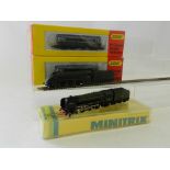 Four N Gauge locomotives, a Minitrix Brittania in BR green,