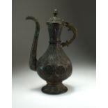 An Islamic bronze repousse ewer, 19th Century,