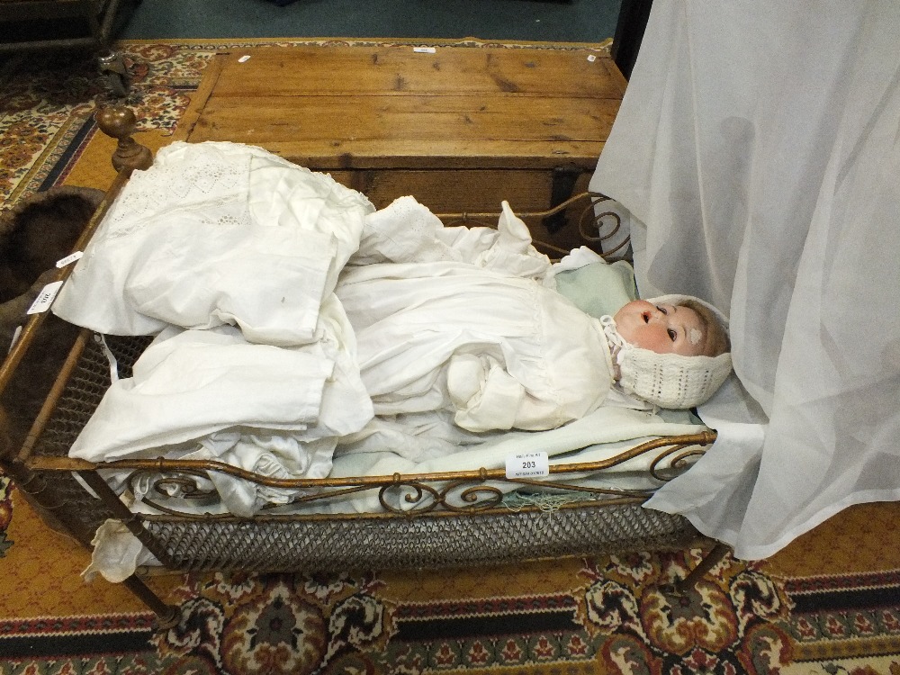 A doll and doll's crib