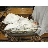 A doll and doll's crib
