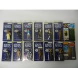 A group of 14 Dr Who figures by Dapol in unopened display packs to include two in earlier packaging