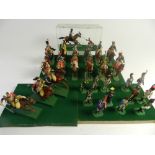 Twenty nine Historex cavalry, and foot soldiers in four display cases,