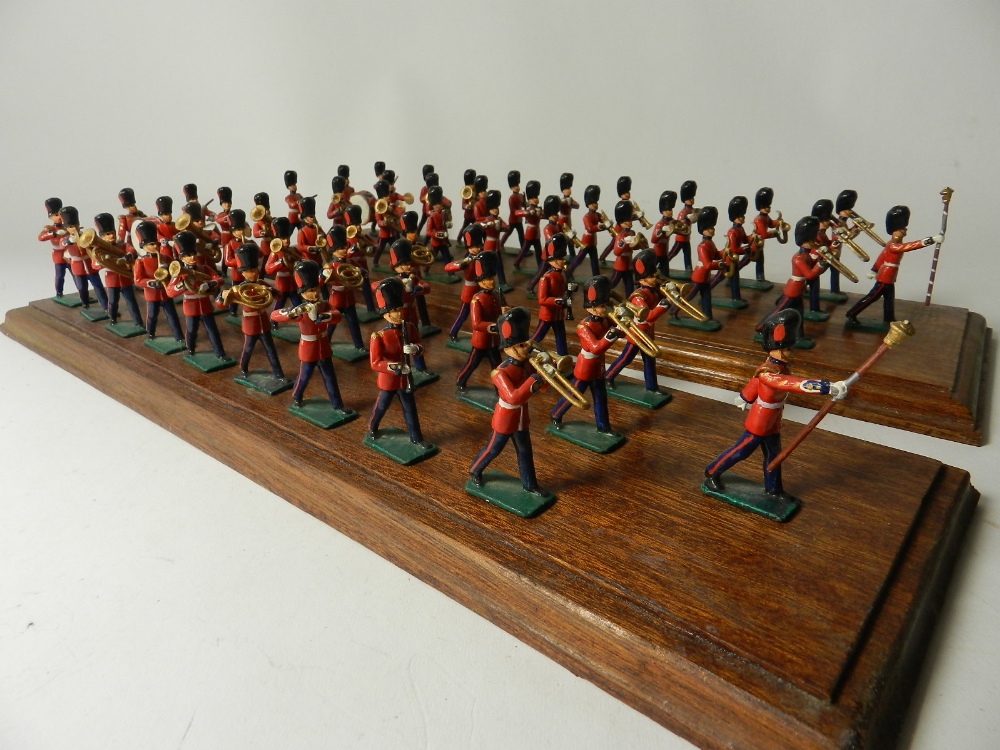 Two 28 member 55mm figure military bands mounted on display plinths,