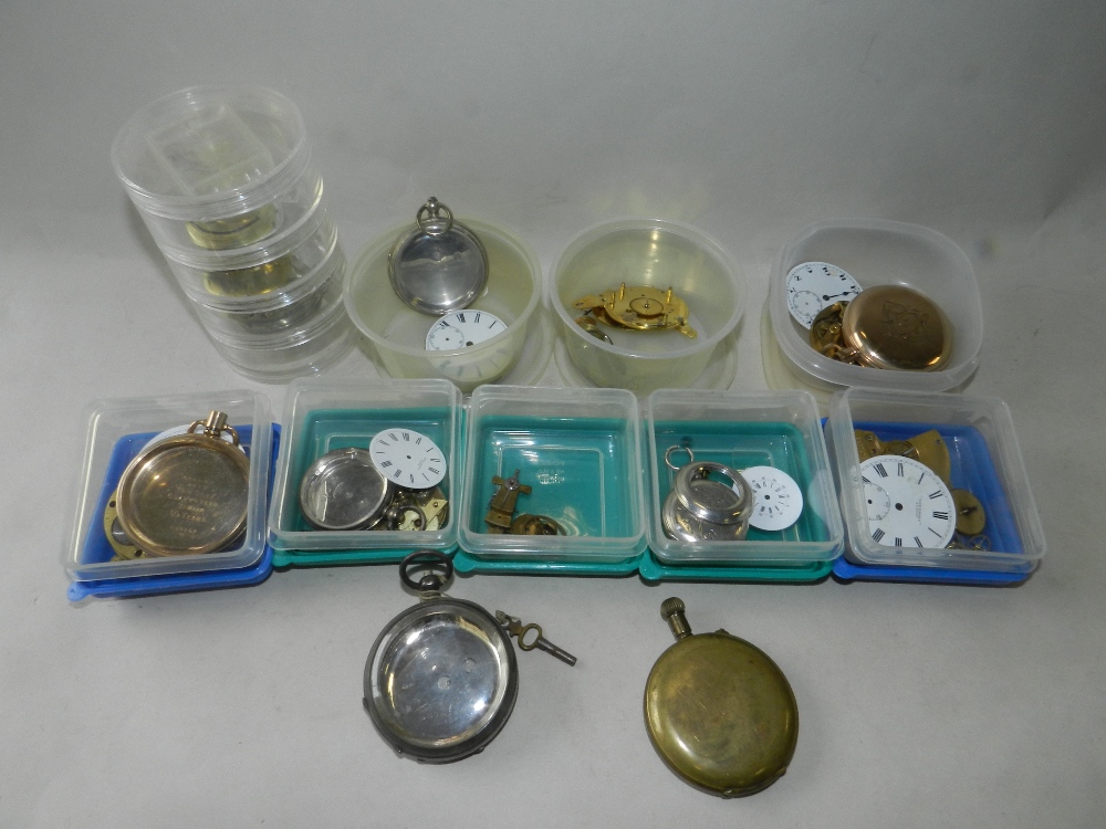 A silver case to a pocket watch together with further pocket watch cases,