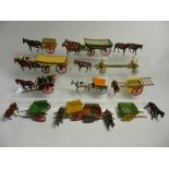 A group of 11 pre and post war lead farm vehicles by Britains, Charbens and others,