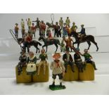 A 'Village Idiot' figure by Britains, the lot also to include circus figures,