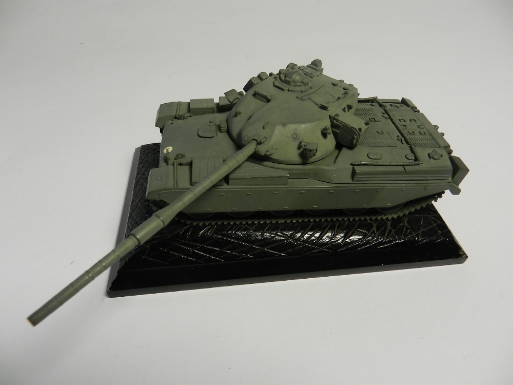 A 1/48 scale model of a Chieften Tank mounted on an inclined base by Denzil Skinner,