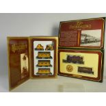 Two Hornby 00 gauge boxed sets, Stephenson's Rocket comprising the loco, tender and three coaches,