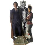 A set of four like size cut out figures to include K-9, Cyberman, Dr Who and Martha Jones,