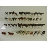 A group of 41 lead figures of horses in various poses and types by Britains and other manufacturers