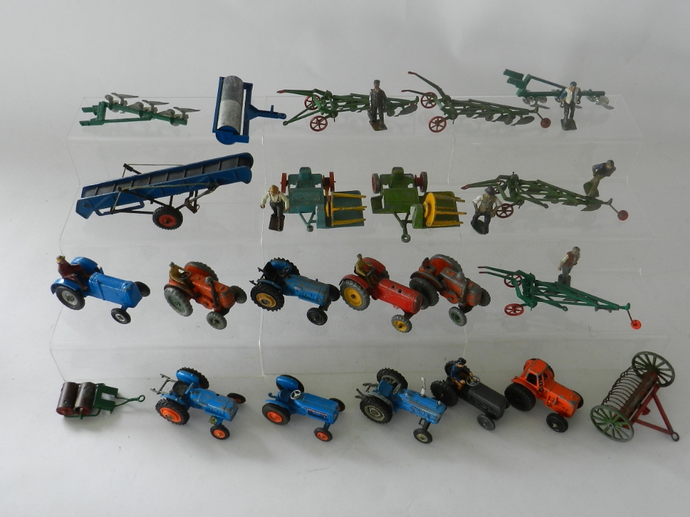 A group of die cast and lead farm implements and personnel by Britains, Dinky,