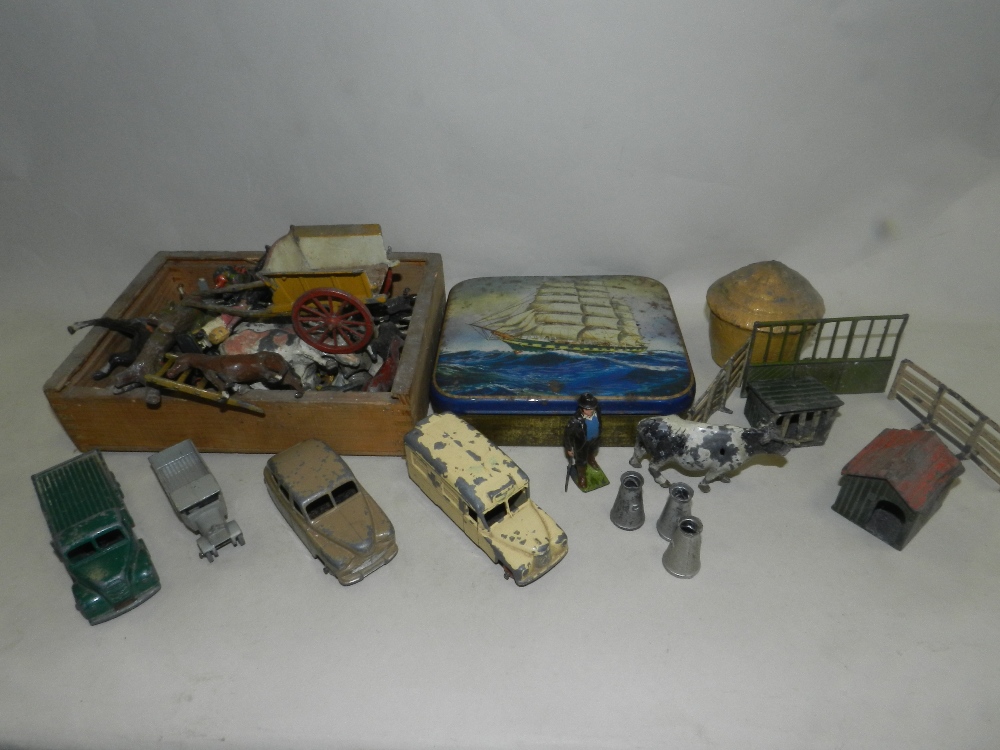 A collection of British lead figures of an agricultural nature with associated vehicles and