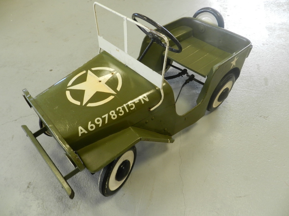 A Triang pedal car in the form of a U S Army Jeep,