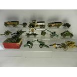 A group of Britains army equipment items to include a 3 axle lorry and 2 Beetle lorries,