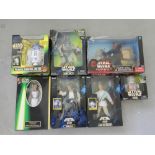 7 unopened Star Wars 12" figures by Kenner of recent manufacture to include Remote Control R2-D2,