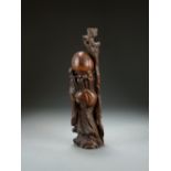 A Chinese rootwood figure of Shoulao, late Qing Dynasty,