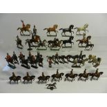 A quantity of mounted troops from various periods and regiments by a number of manufacturers,