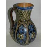 A James Stiff & Sons Lambeth salt glazed stoneware Art pottery ewer decorated with stylised flowers
