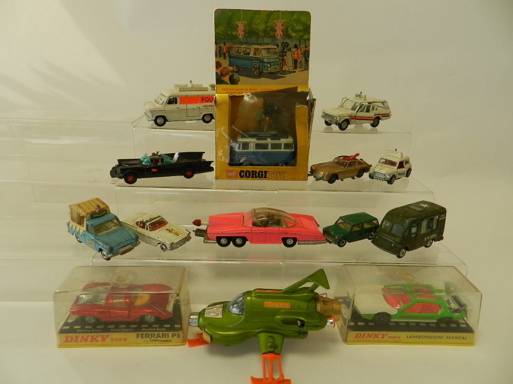 A mixed lot of die cast toys to include a boxed Corgi 479 Commer Mobile Camera,