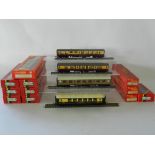 A quantity of coaches (11 boxed) 3 x BR, 3 x GWR, 3 x Pullman, 1 x Southern, 1 x 4 wheel coach,