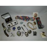 A collection of various pieces of costume jewellery and watches to include bead necklaces,