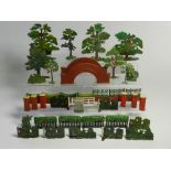 A collection of lead accessories by Britains and other makers to include trees, fencing, bridge,
