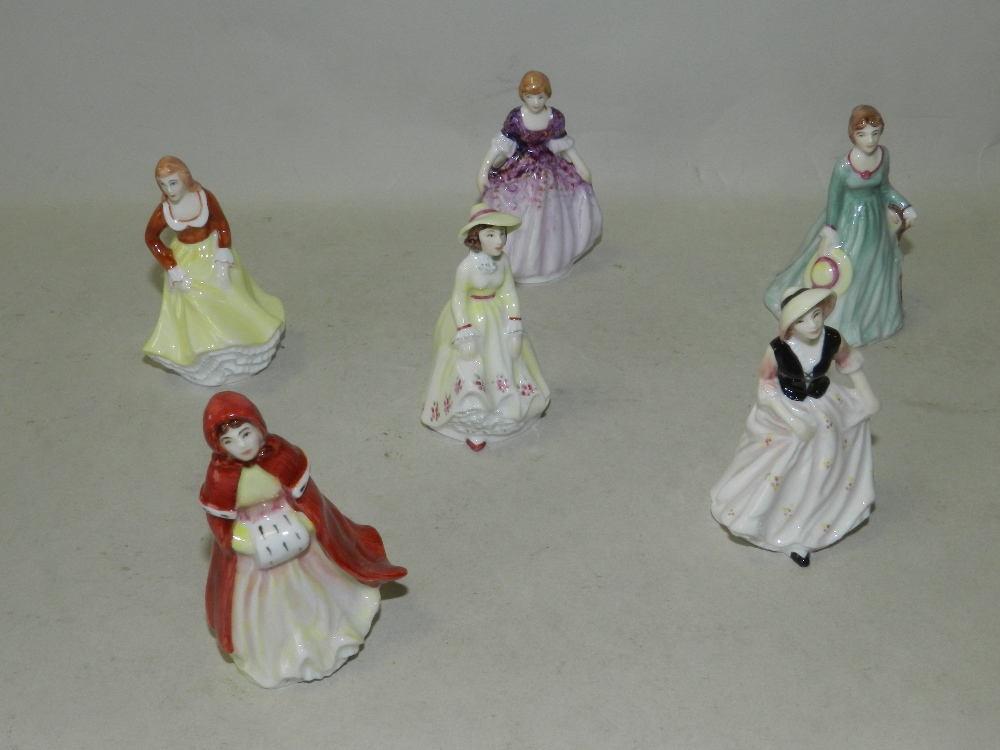 A collection of six miniature porcelain lady figures by J Peers