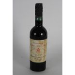 A 75cl bottle of Madeira wine, label for Centenary Solera 1845 Bual, Shipped by Cossart,