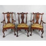 A set of six 19th century American carved cherrywood dining chairs in the Chippendale style