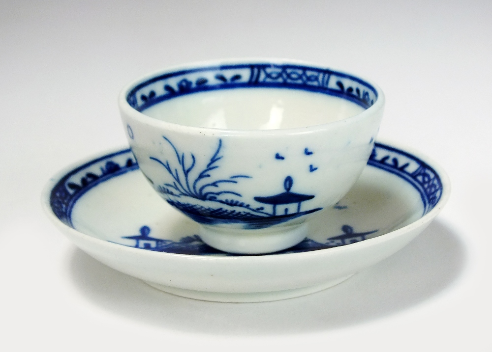 A Caughley toy teabowl and saucer, circa 1785, painted in underglaze blue with the Island pattern,