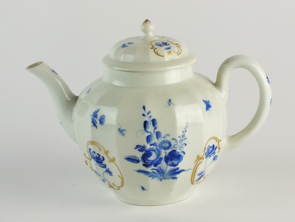 A Worcester teapot and cover painted with 'dry blue' flowers, circa 1770,