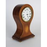 An Edwardian mahogany boxwood line strung balloon shaped timepiece,