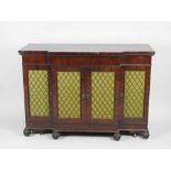 An early Victorian mahogany breakfront low cabinet with four lattice grill doors with replacement