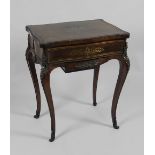 A 19th century French rosewood and brass inlaid serpentine work table,