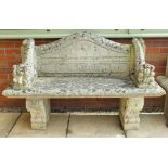 A pair of reconstituted stone garden benches,