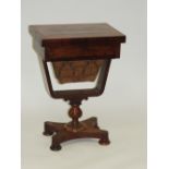 A mid 19th century mahogany fold-over work table the rectangular top opening to reveal a baize