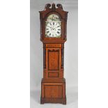 A mid 19th century oak eight day longcase clock the 14 inch arch enameled dial signed D Jones,